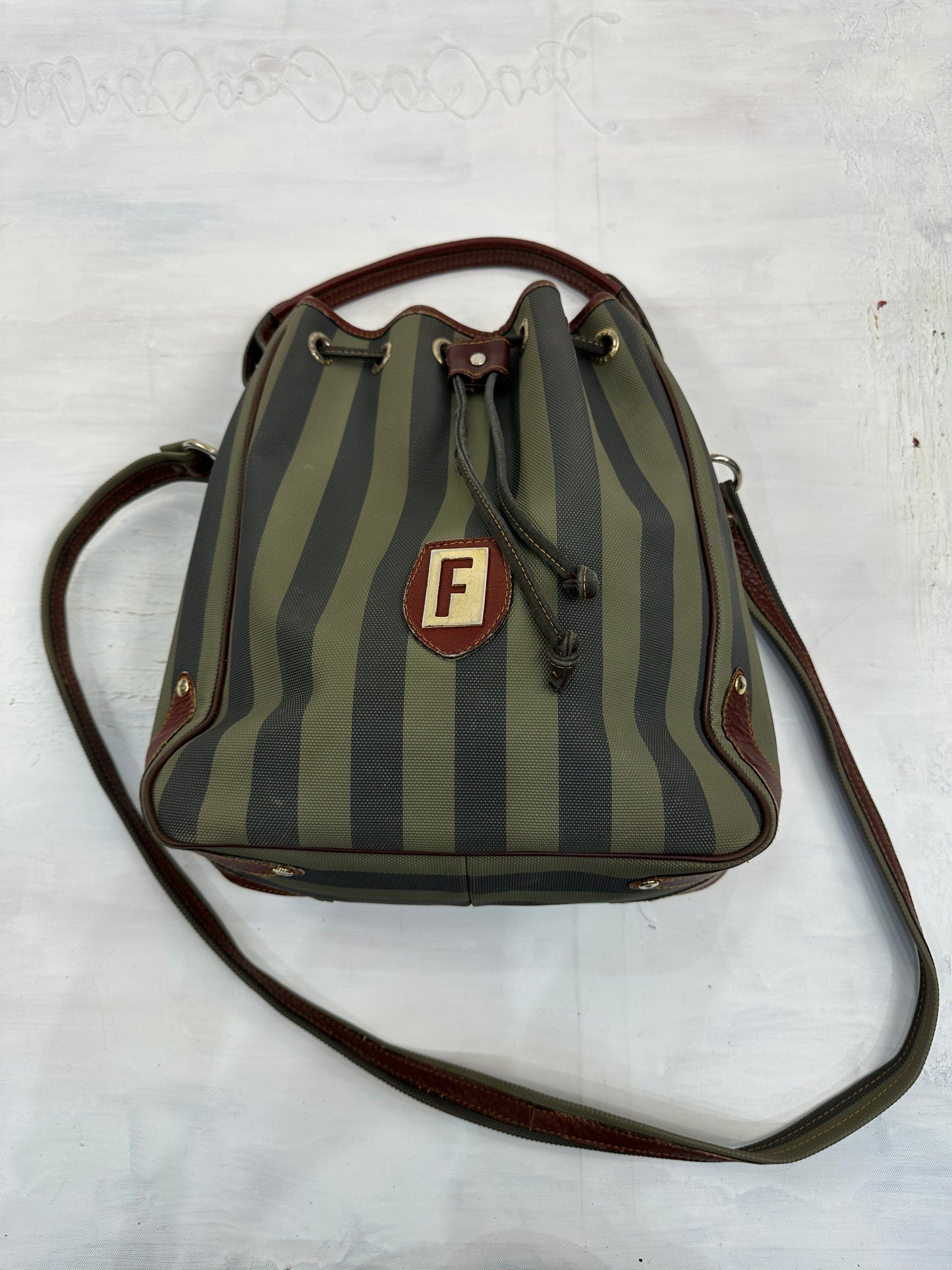 vintage edit: indie sleaze | green and navy striped shoulder bag