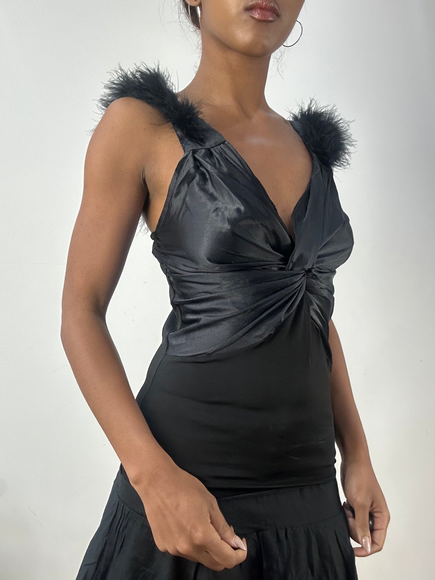 BEST PICKS | small black fitted vest top with faux fur straps