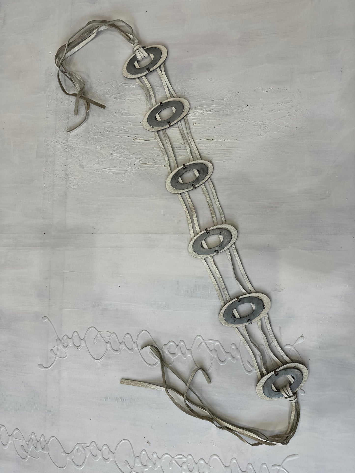 winter edit | white faux leather silver circle tie up belt