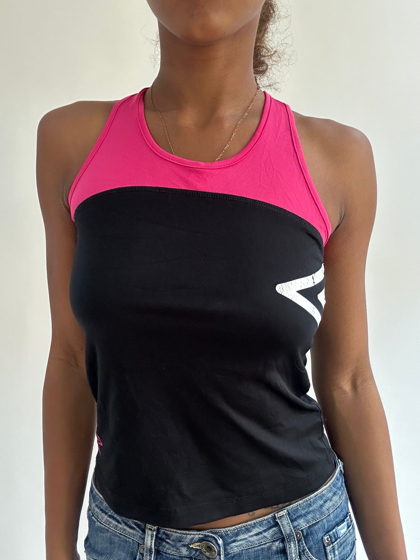 BEST PICKS | small black and pink fitted vest