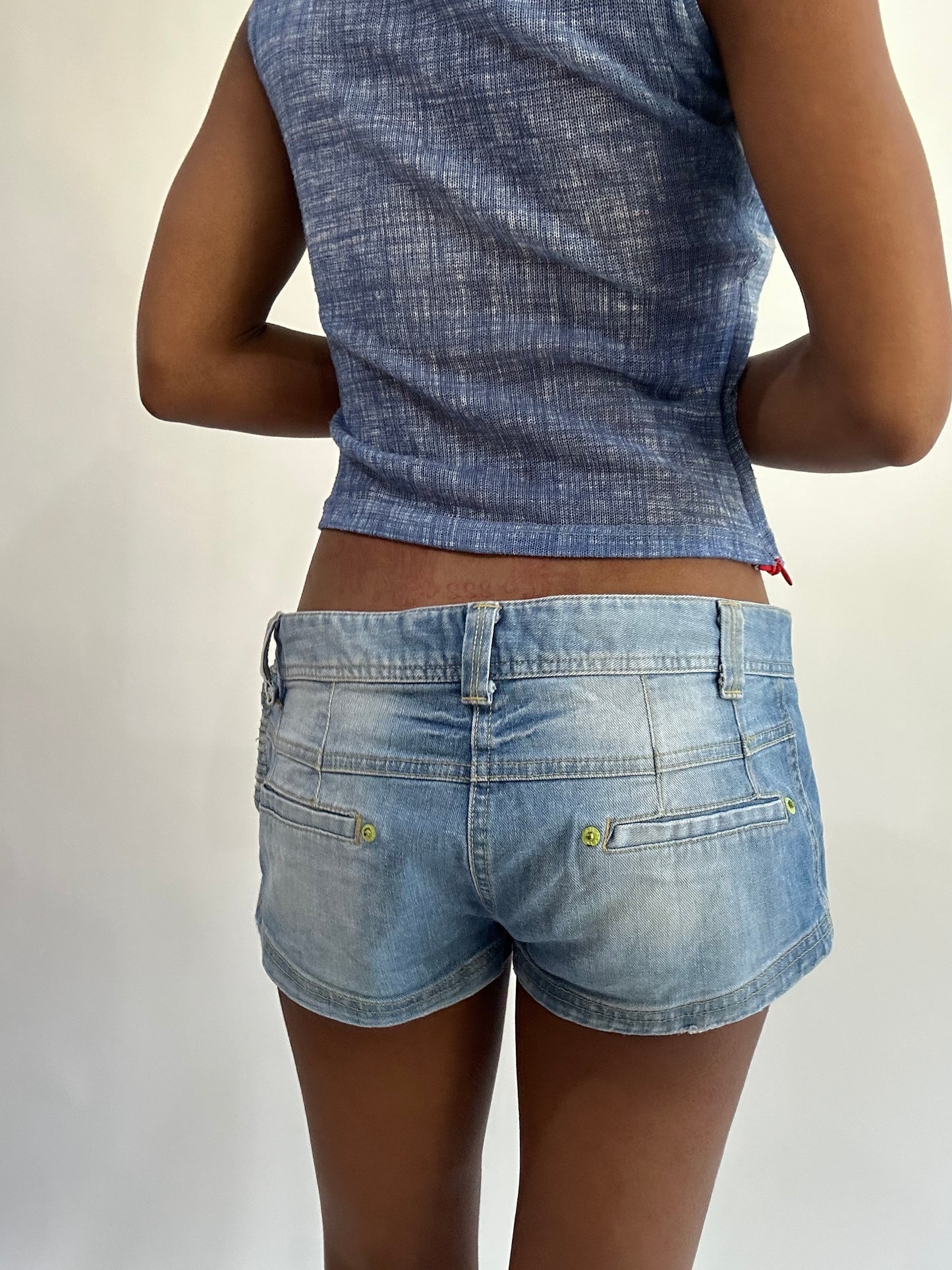 wag drop | medium blue denim mini shorts with yellow detailing