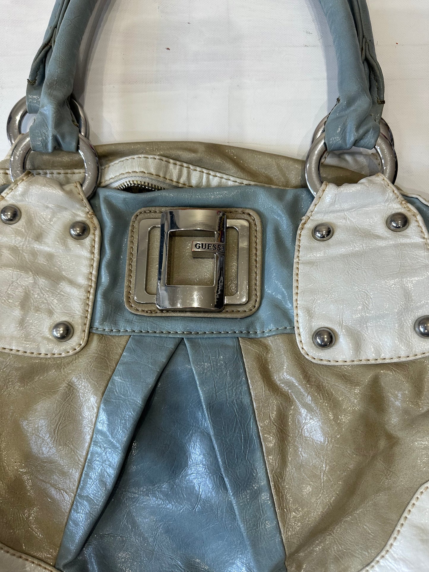 LFW edit | blue and beige guess faux leather bag with silver hardware