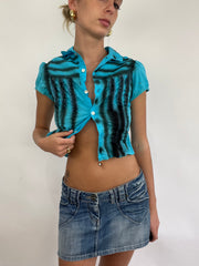 COACHELLA DROP | xs blue button up short sleeved shirt with black graffiti style stripes