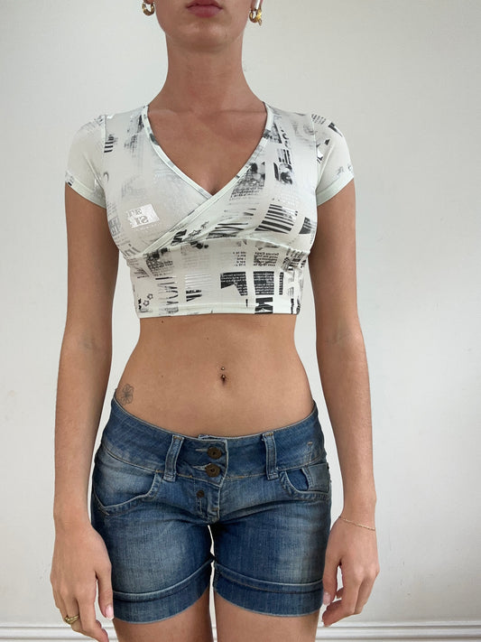 💻‼️ pale green and silver newspaper print crop top