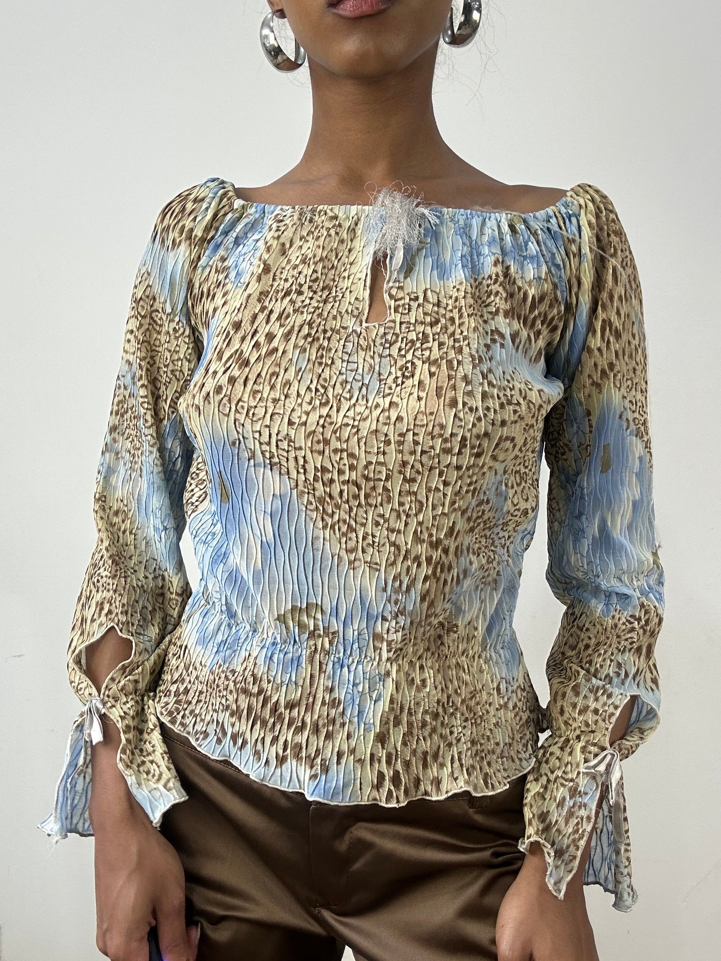 BEST PICKS | small blue shirred long sleeve top with leopard print pattern