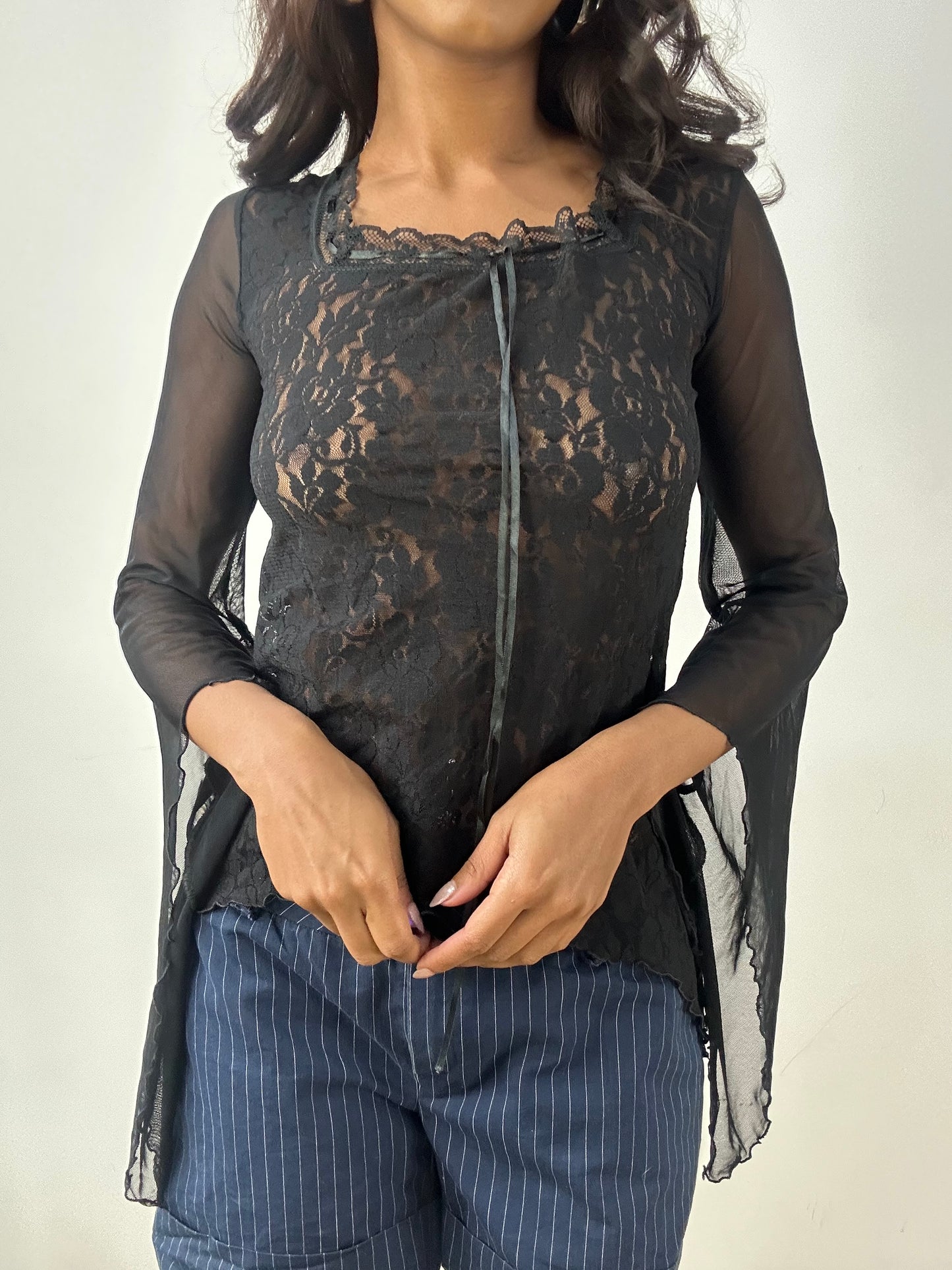 BEST PICKS | small black long sleeve top with floral lace detail