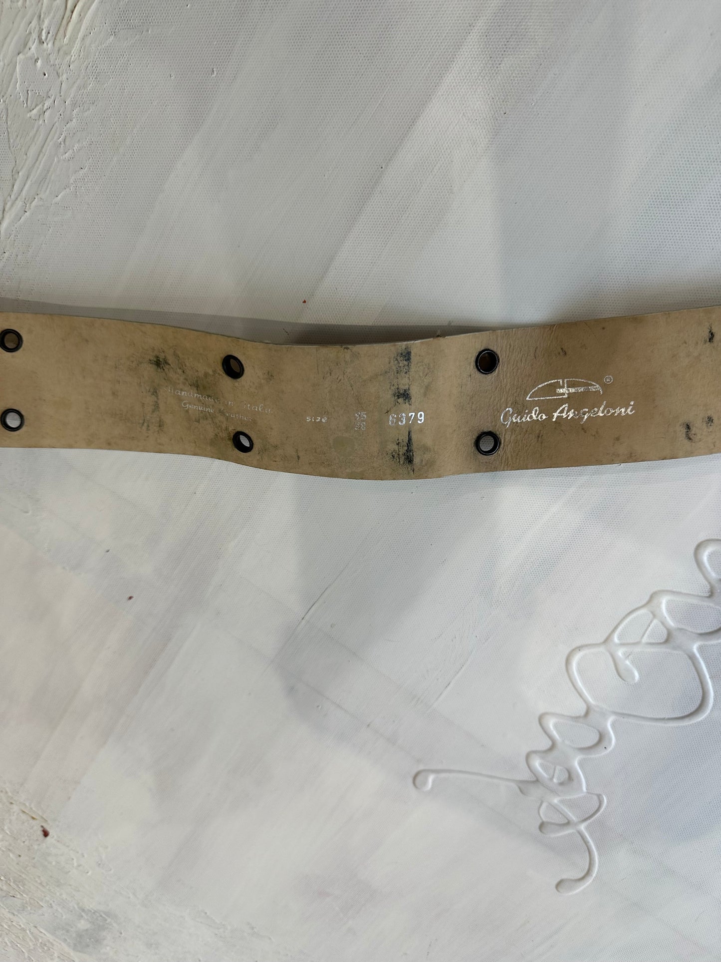 BEST PICKS | brown faux leather embossed belt with metal hardware