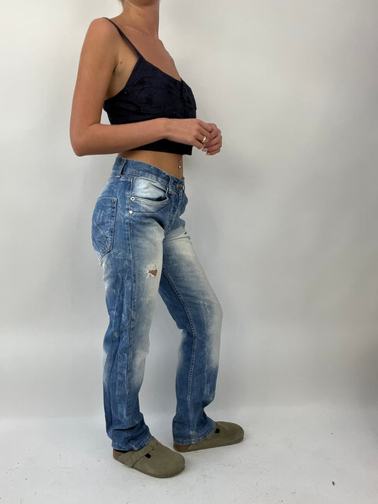 COASTAL COWGIRL DROP | medium light wash denim jeans with distressed detail