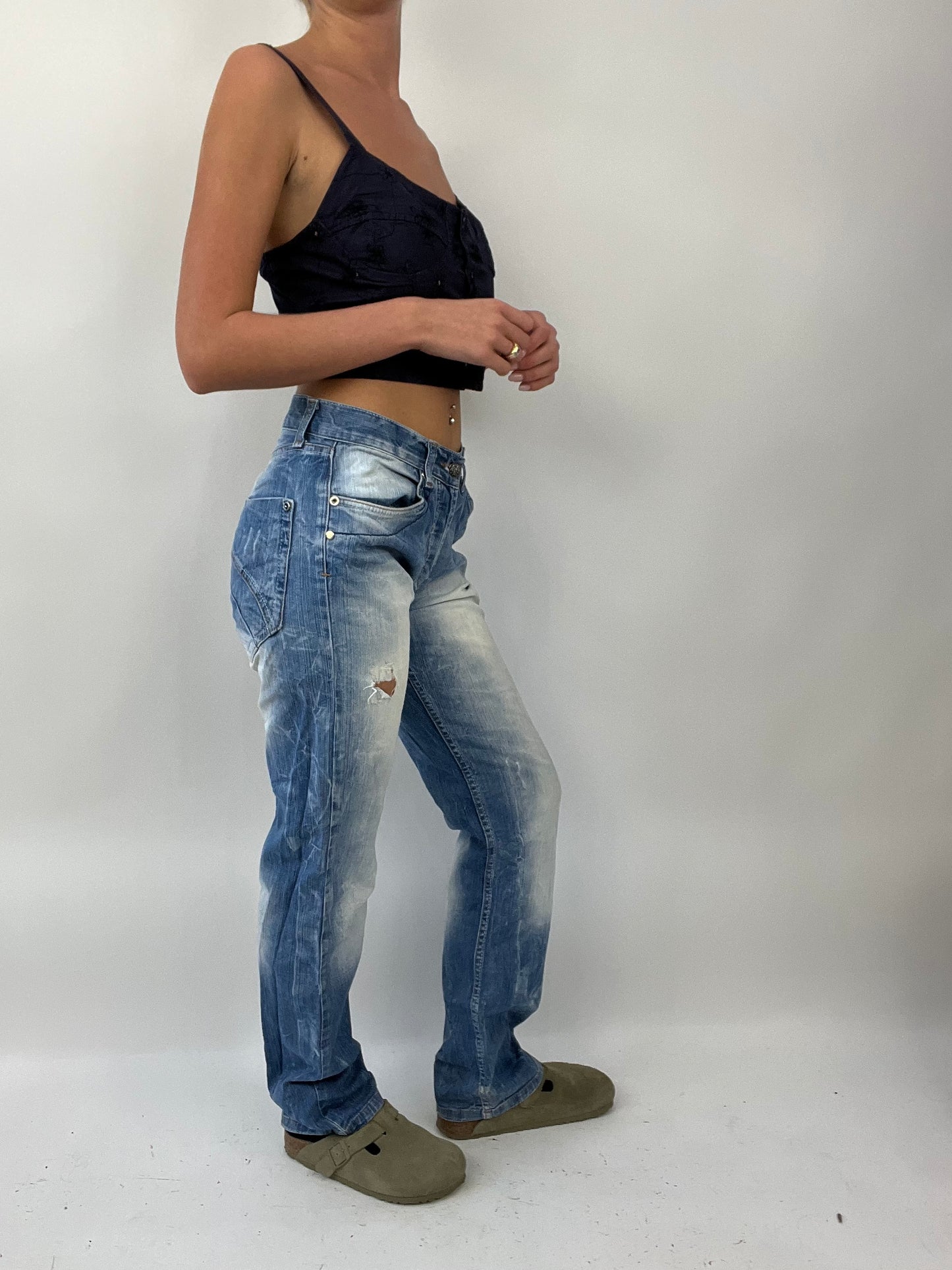 COASTAL COWGIRL DROP | medium light wash denim jeans with distressed detail