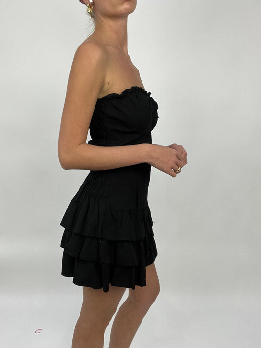 COCONUT GIRL DROP | small black bandeau style dress with ruffle skirt detail