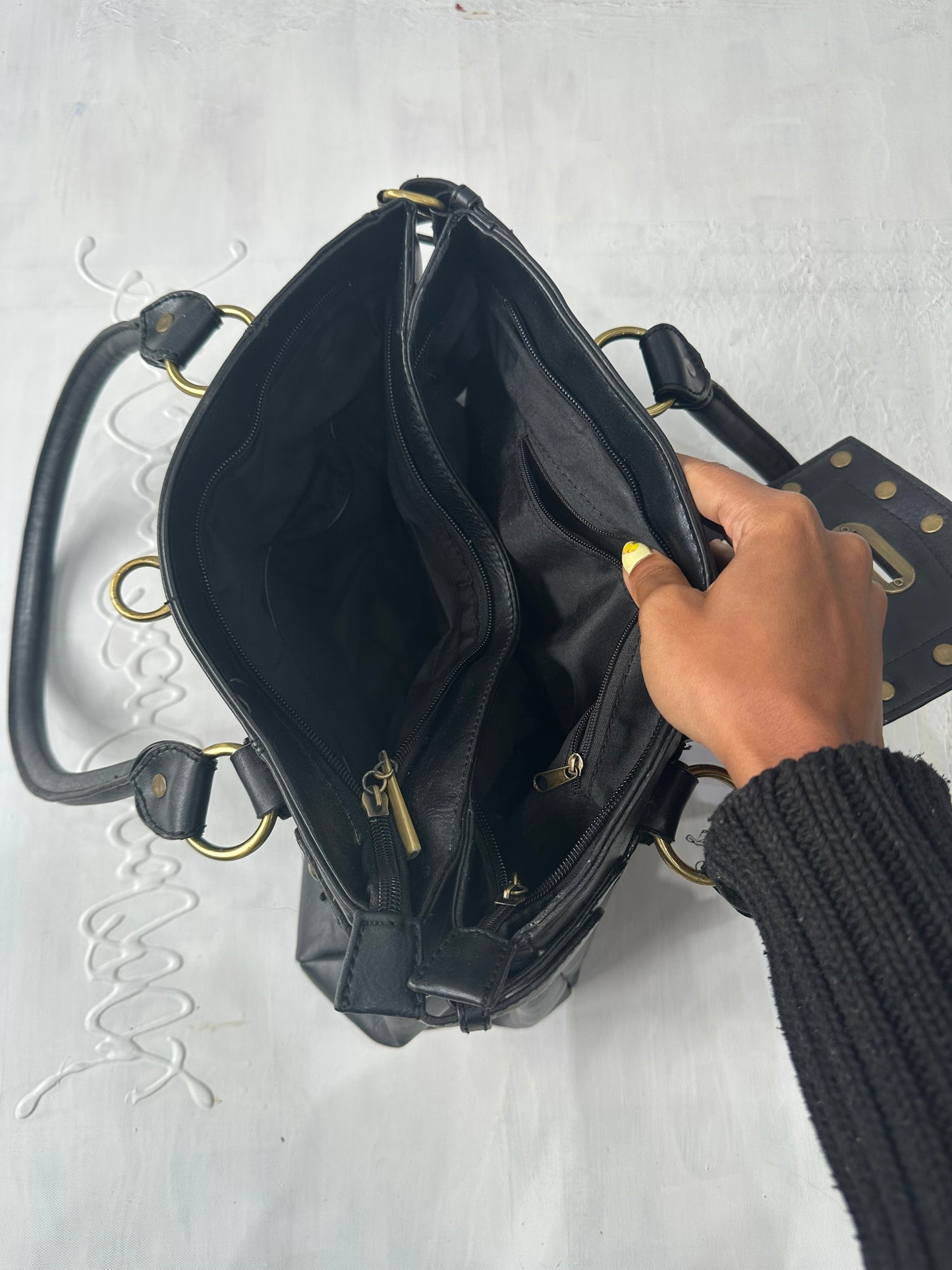 BEST PICKS | black shoulder bag with gold hardware details
