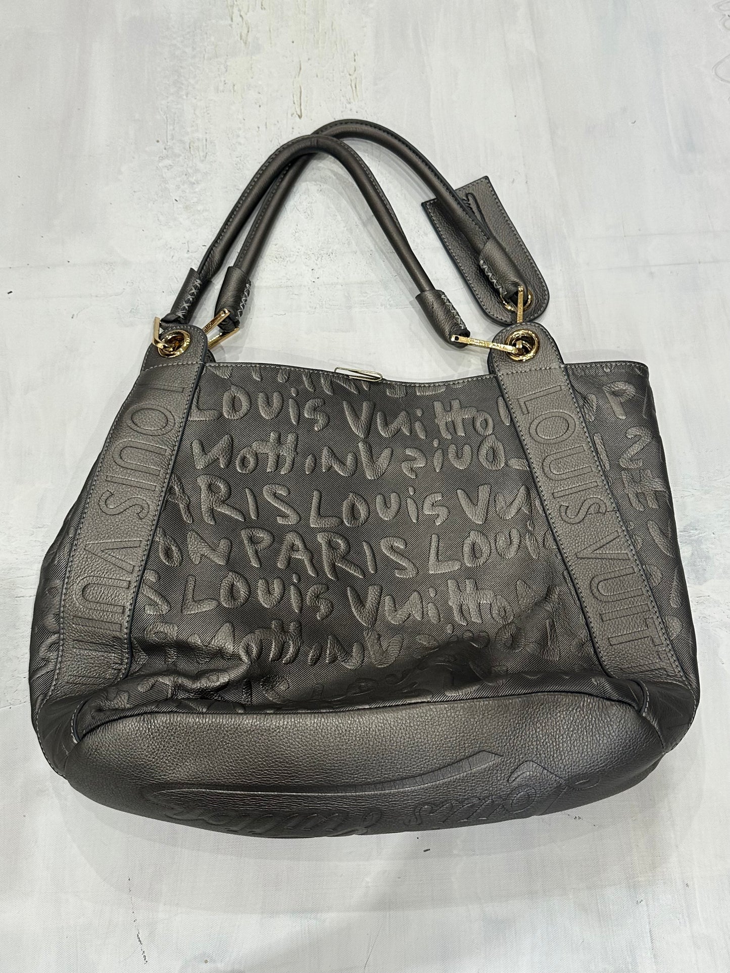 devil wears prada | silver louis vuitton monogram shoulder bag