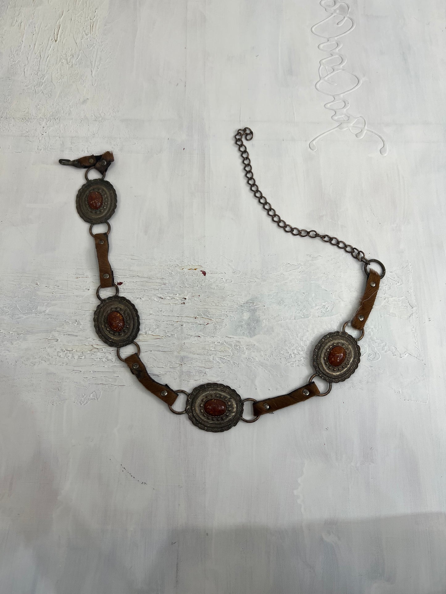 vintage edit twenty eight | brown faux fur belt with disc and chain detail