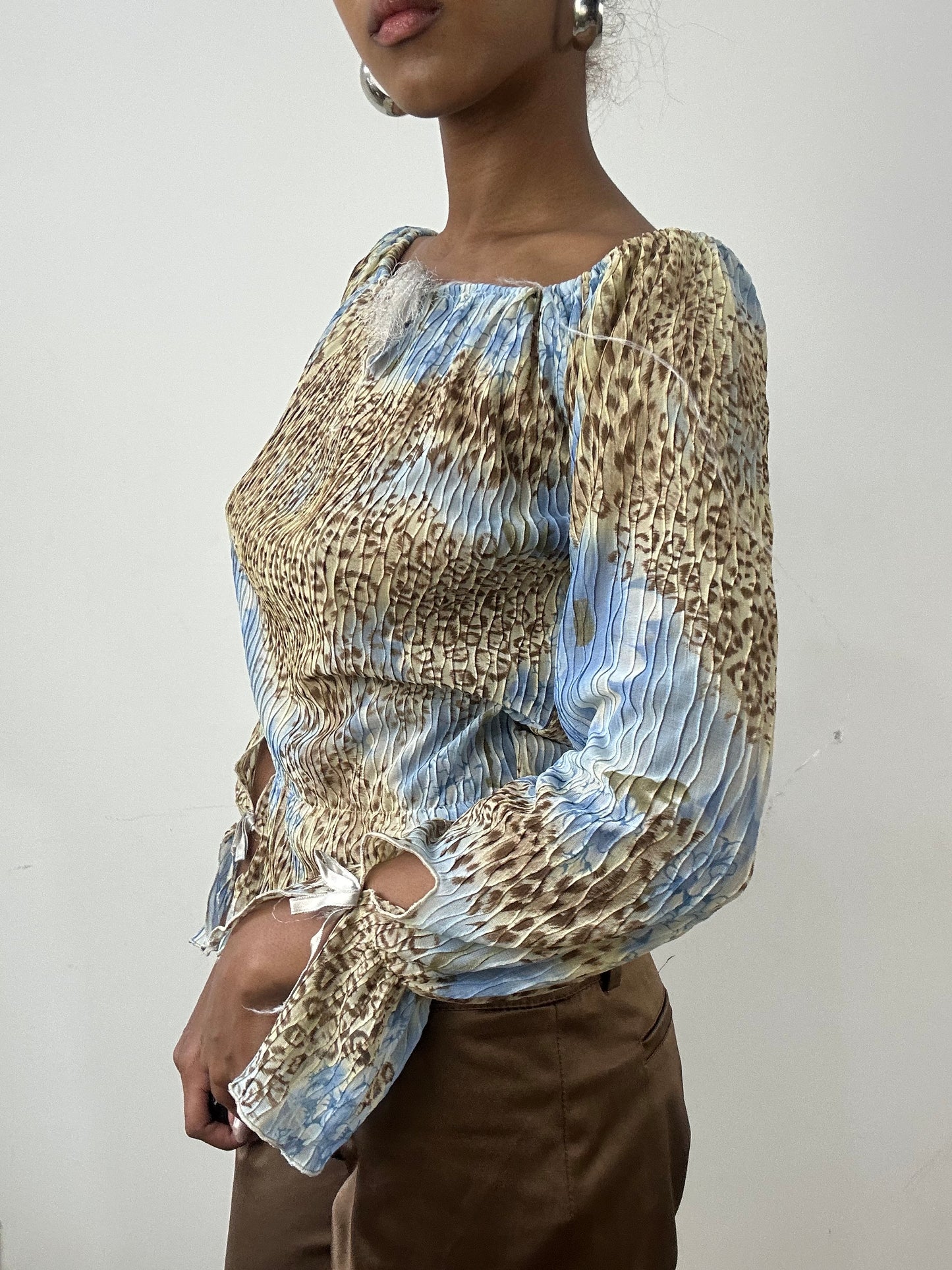 BEST PICKS | small blue shirred long sleeve top with leopard print pattern
