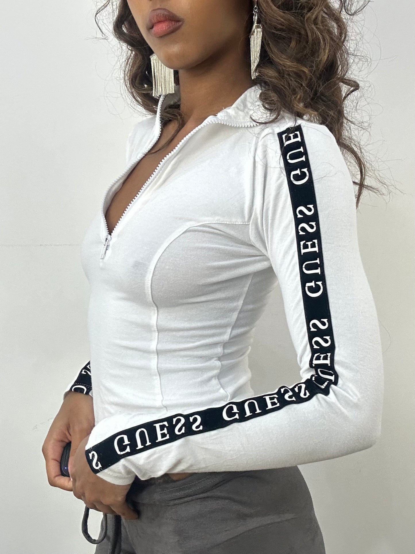 athleisure edit | small white guess zip up long sleeve top
