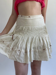 Y2K| small cream mini skirt with beaded detail