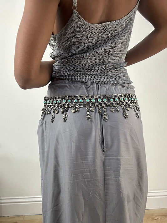 BEST PICKS | silver and blue chain belt with drop metal hardware details