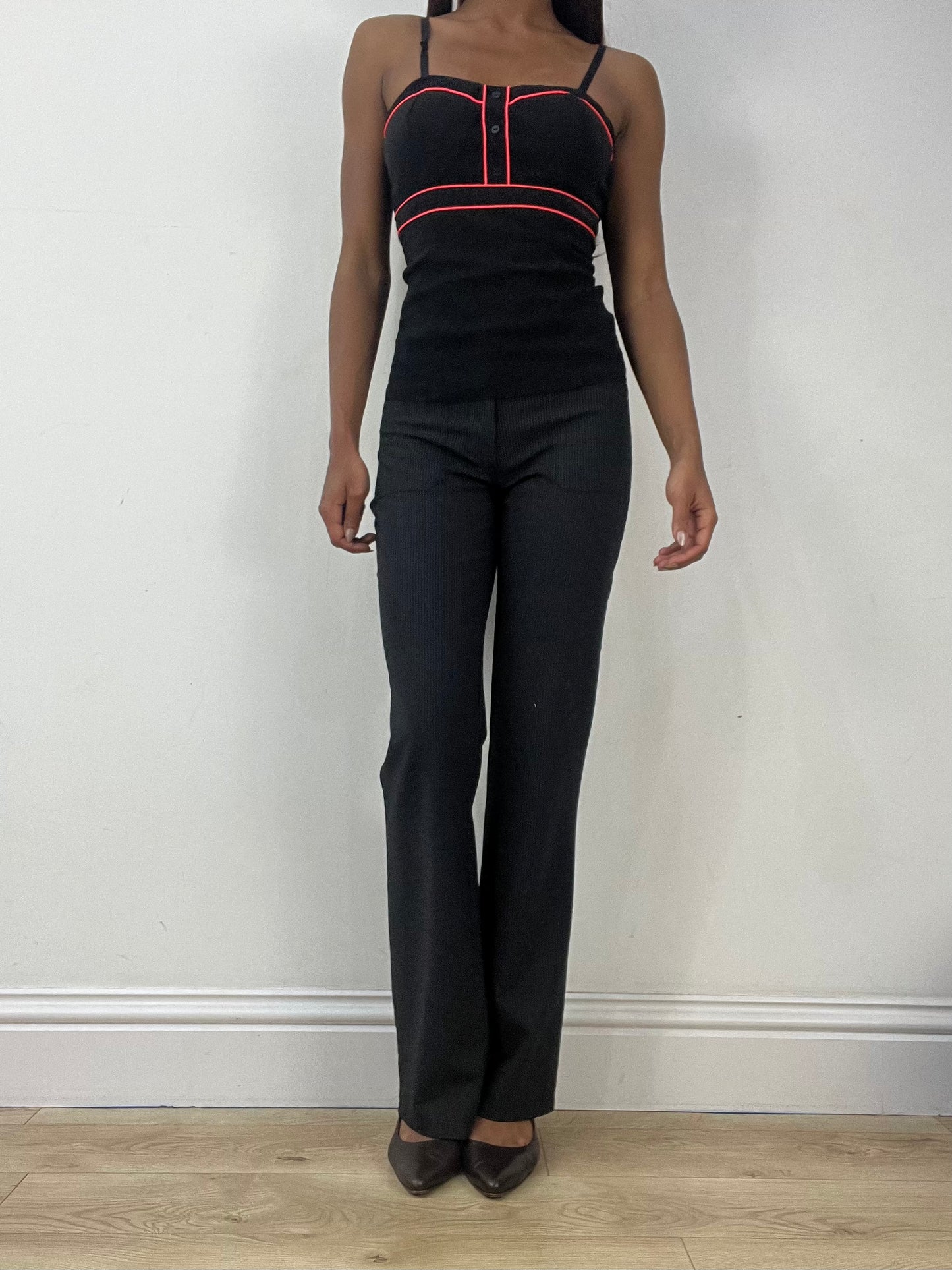 BEST PICKS | small black corset style top with red piping details