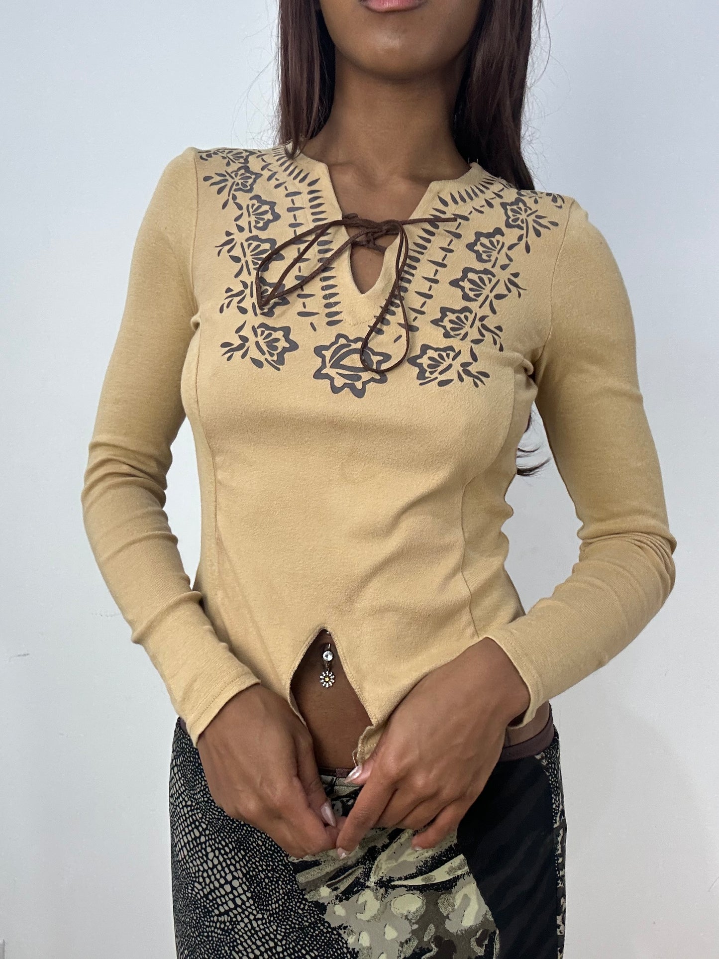 BEST PICKS | small tan long sleeve top with lace up front