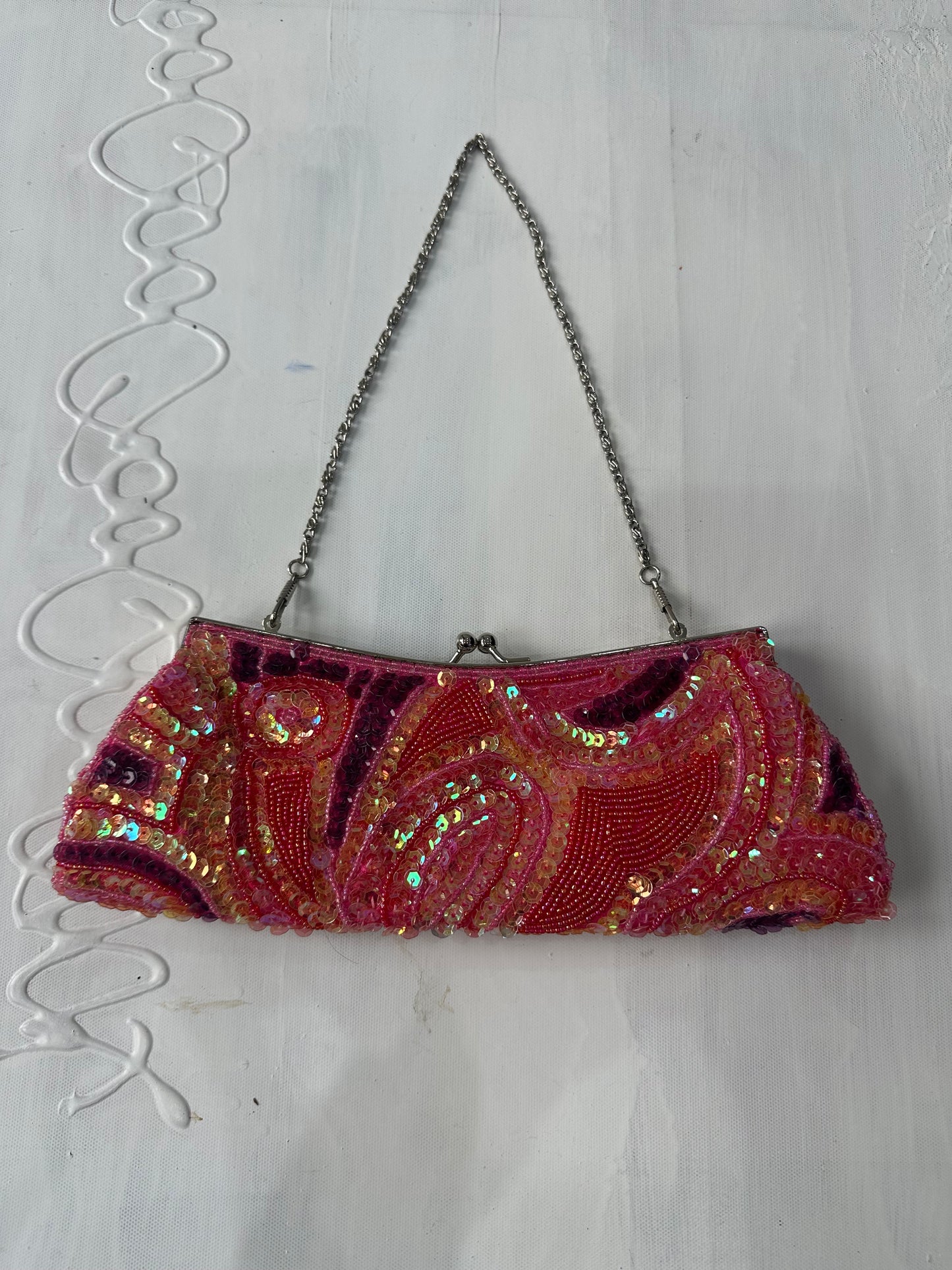 BEST PICKS | pink and purple shoulder bag with iridescent sequins