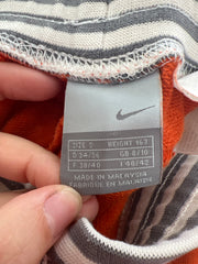 euro trash | small orange nike striped waist capri trousers