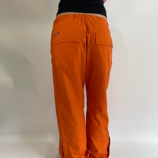 POSH AND BECKS DROP | medium orange oversized cargo trousers with toggle detail