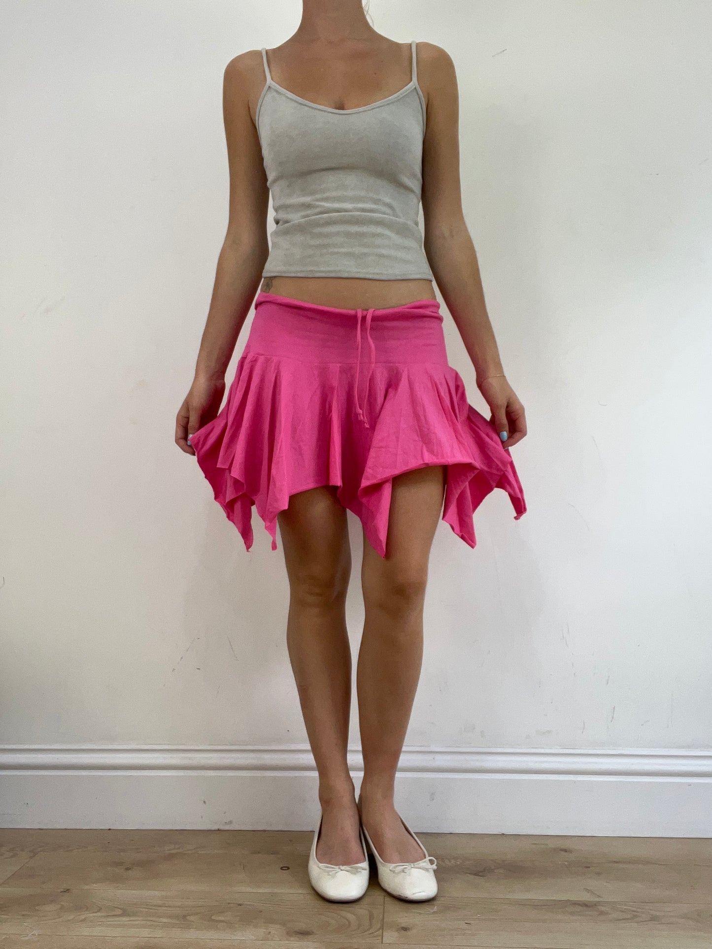💻‼️ small pink billabong asymmetric skirt with white spell out on the bum