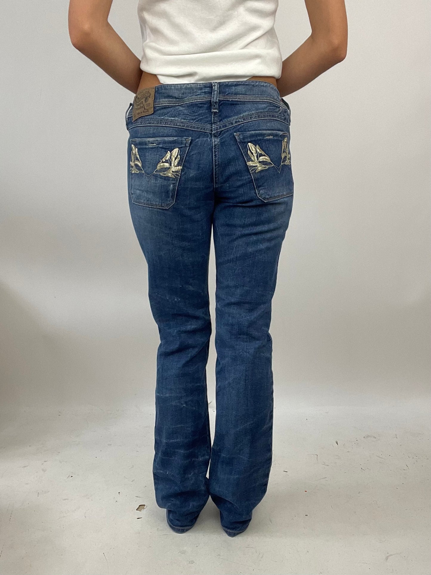 ADDISON RAE DROP | small dark denim diesel flared stretchy jeans