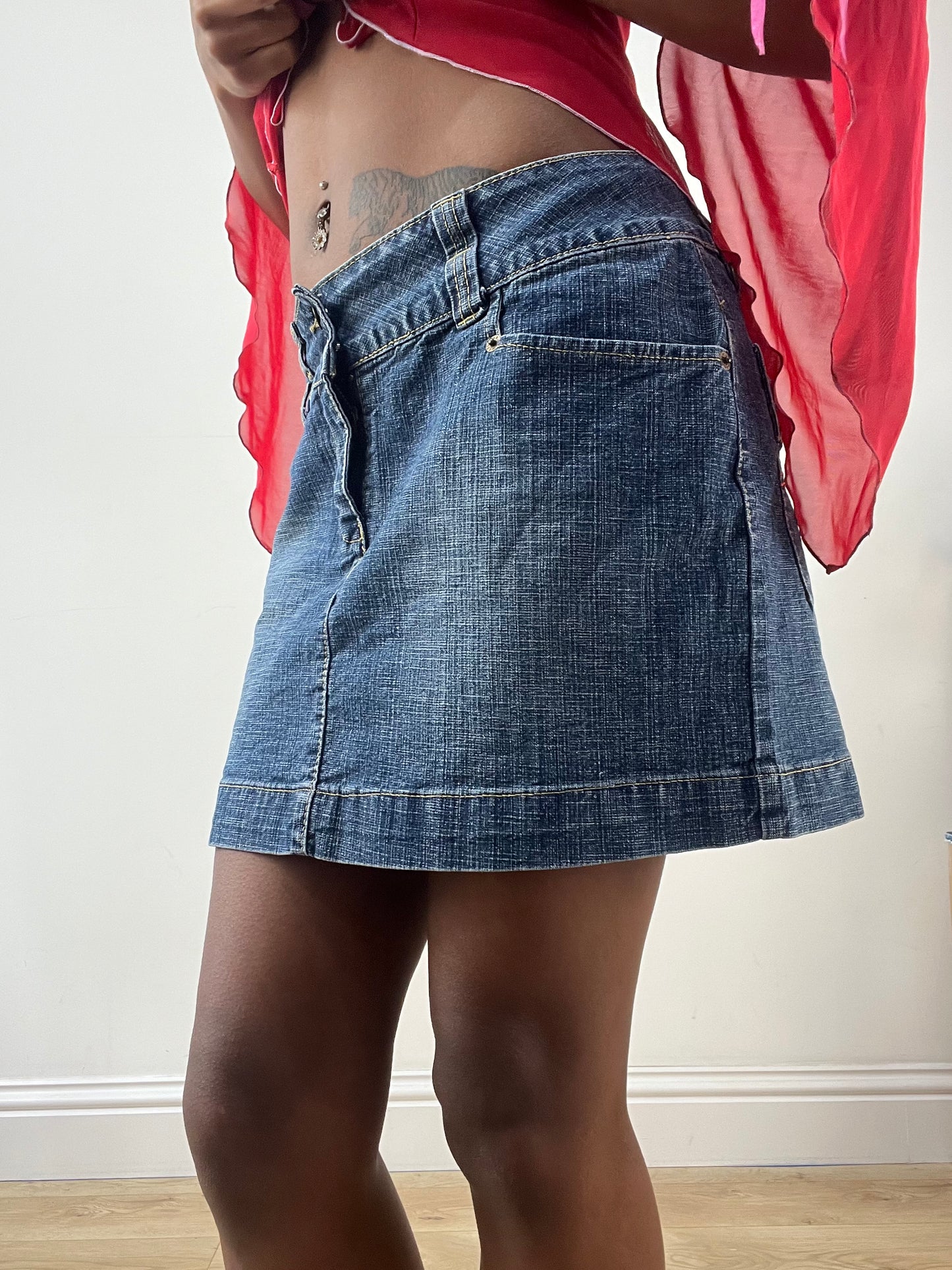 LFW edit | medium denim mini skirt with red embroidery detail