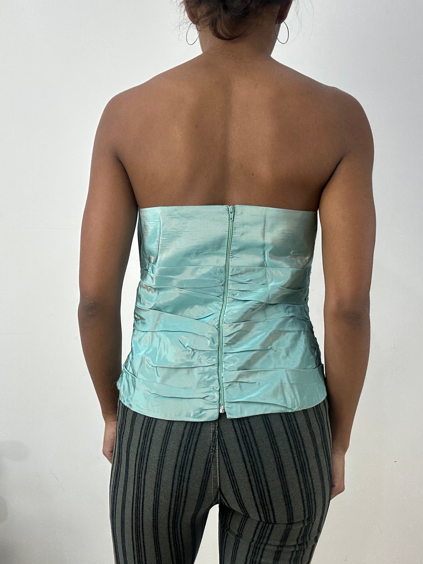 BEST PICKS | small blue iridescent corset top with 3d flower detail