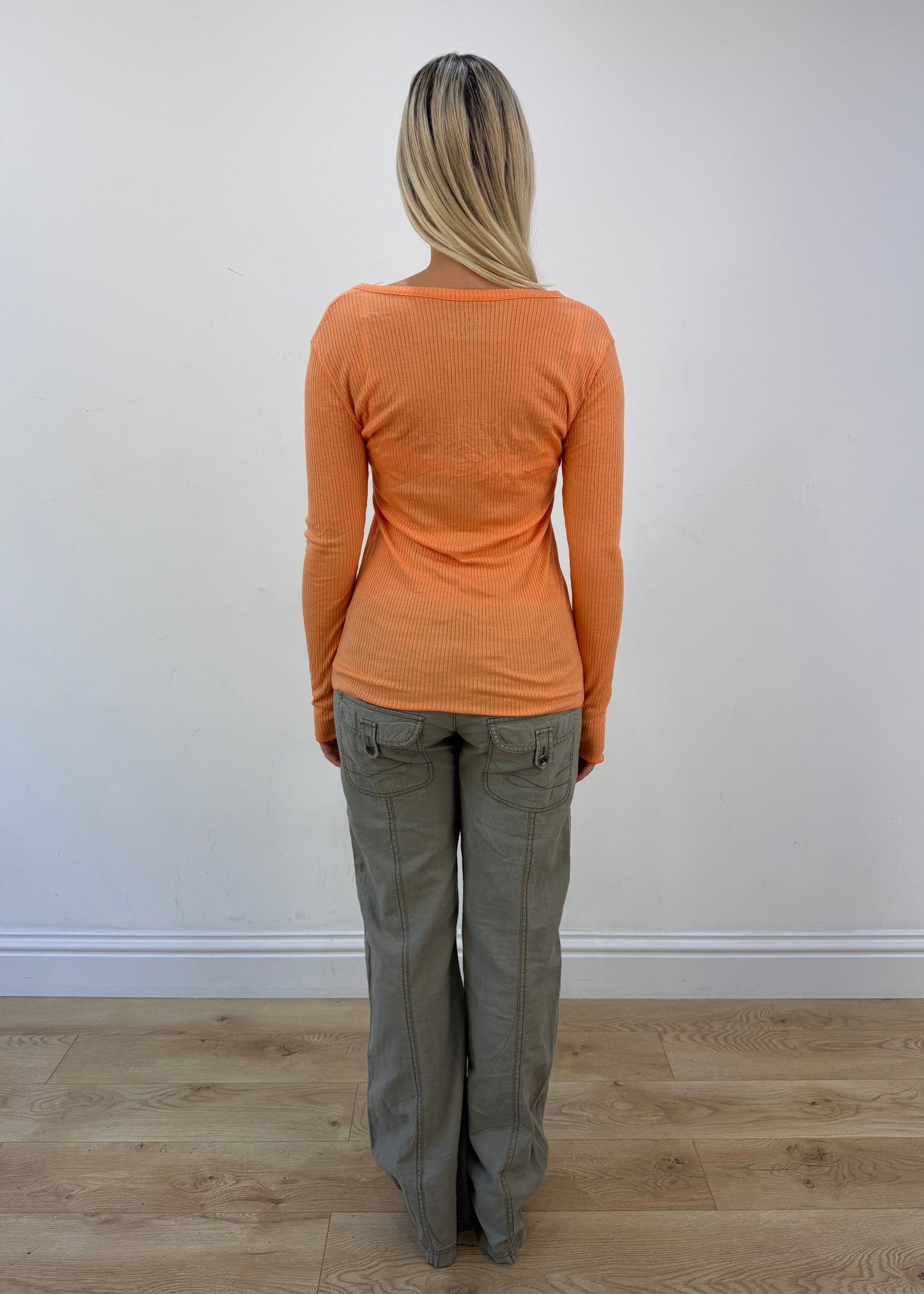 medium orange ribbed button long sleeve top