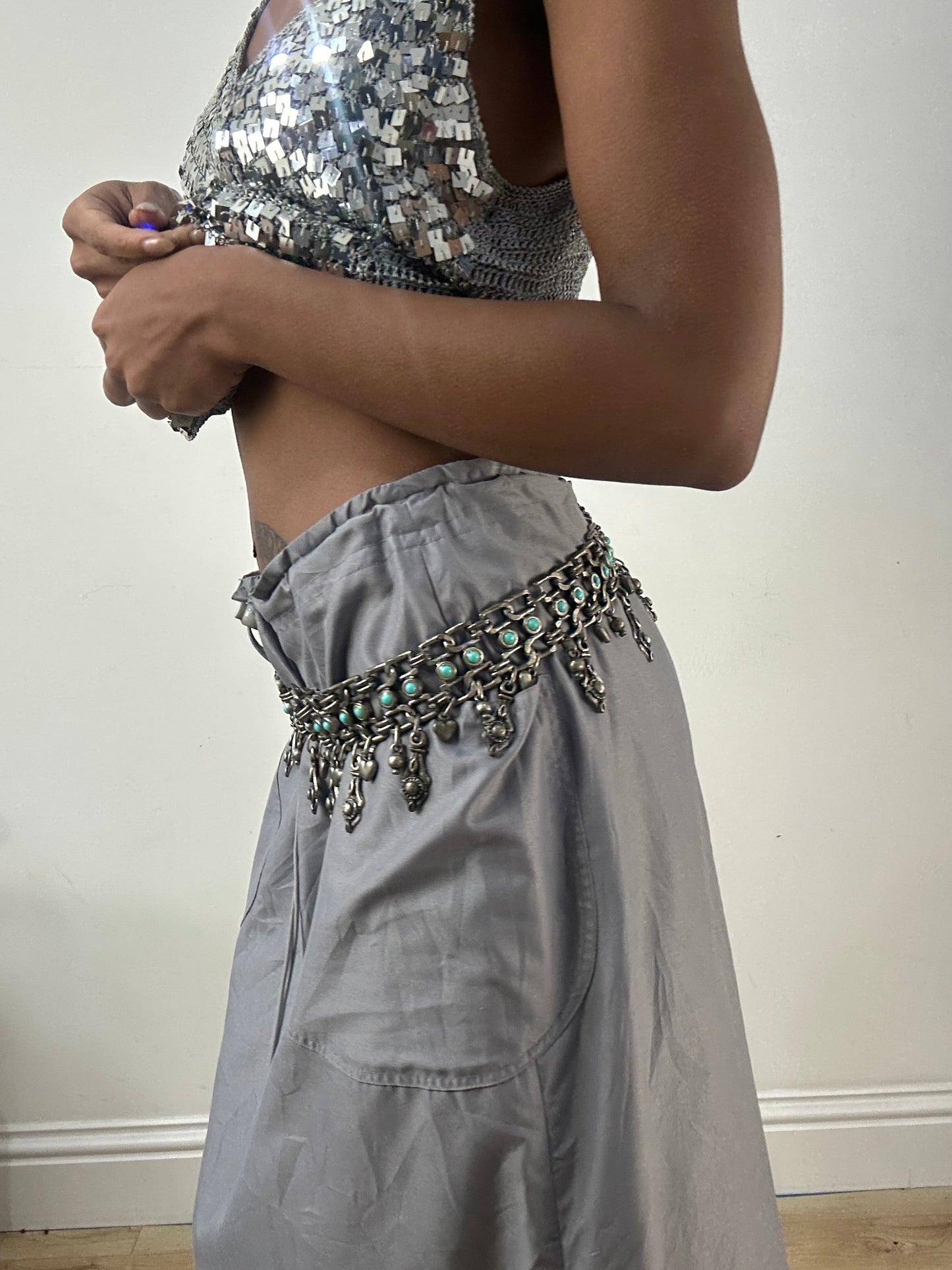 BEST PICKS | silver and blue chain belt with drop metal hardware details