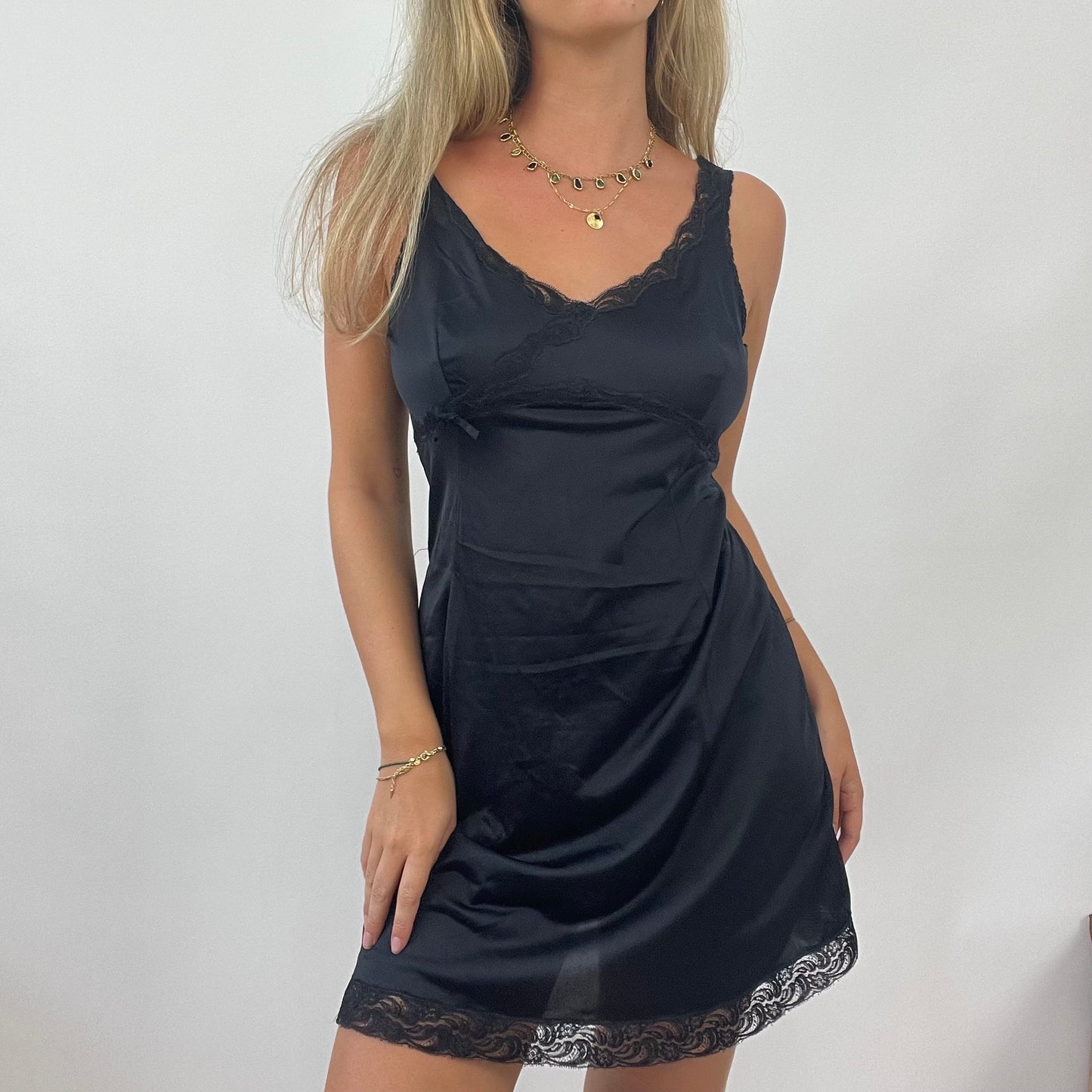 OLIVIA RODRIGO DROP | small black slip dress with lace detail