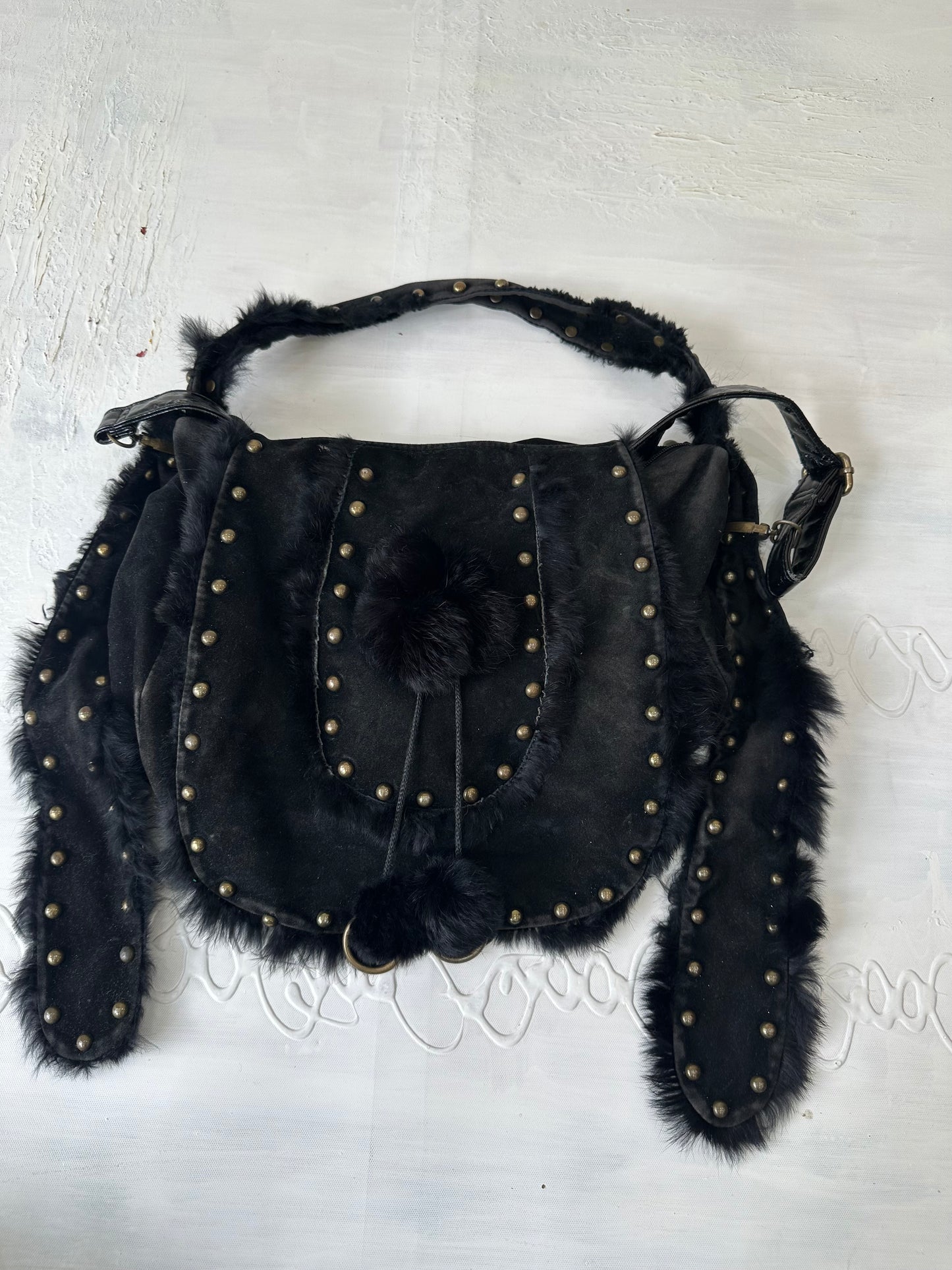 vintage edit twenty-seven | black studded faux fur shoulder bag with pom pom details