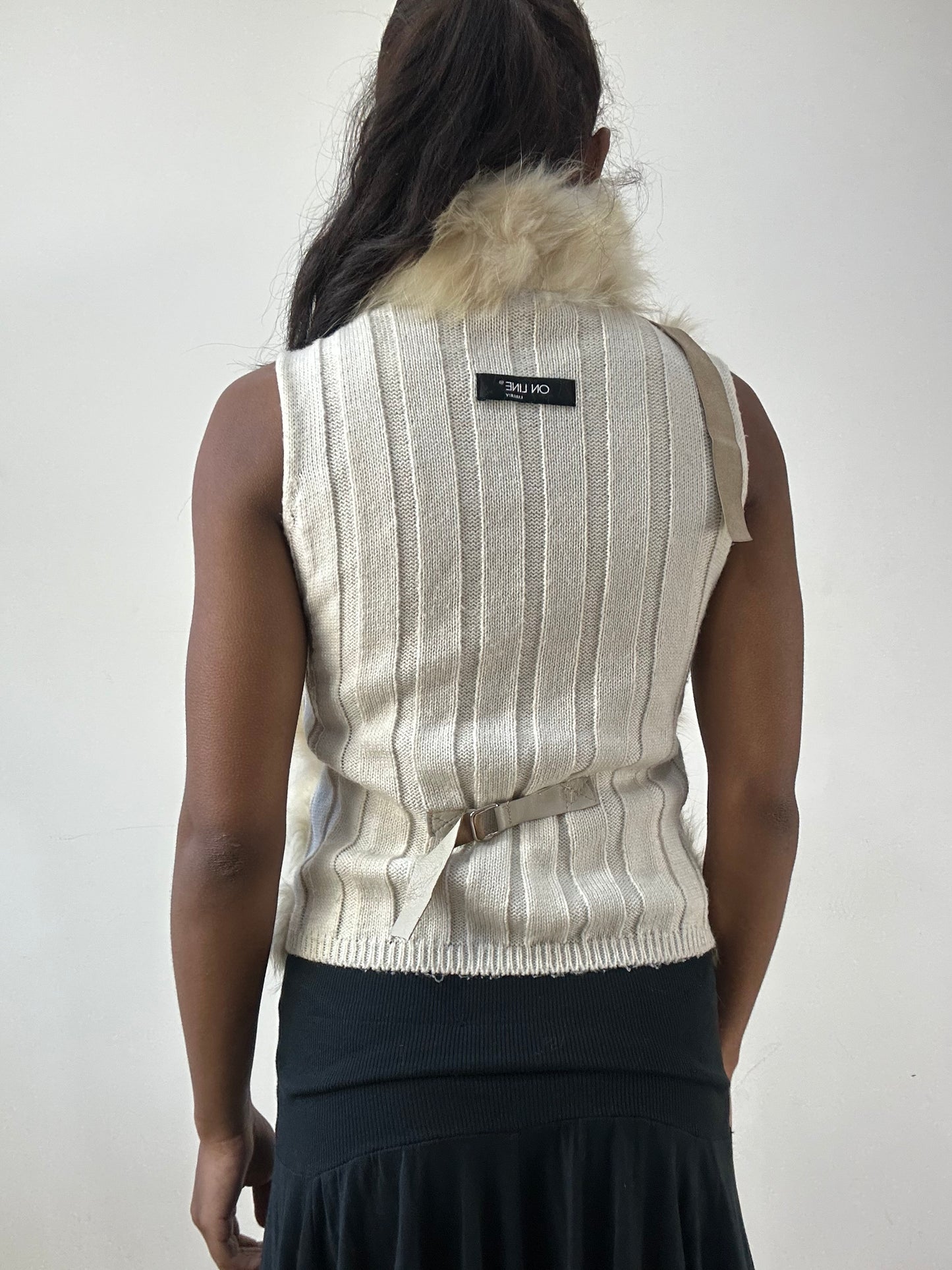 BEST PICKS | small beige fur gilet with distressed details