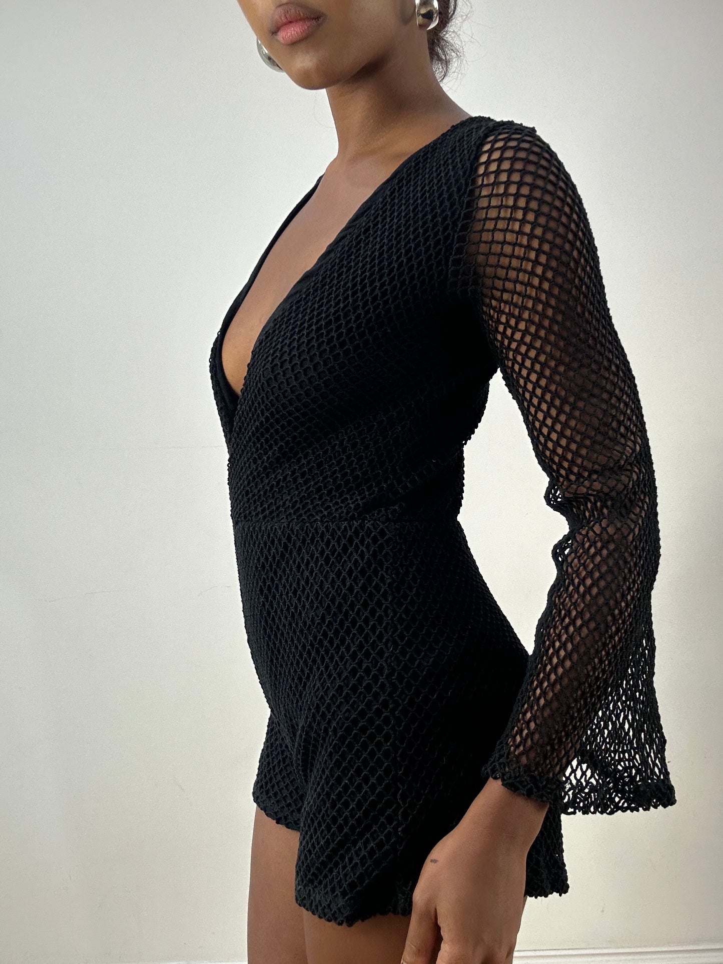 LFW edit | small black playsuit with fishnet overlay
