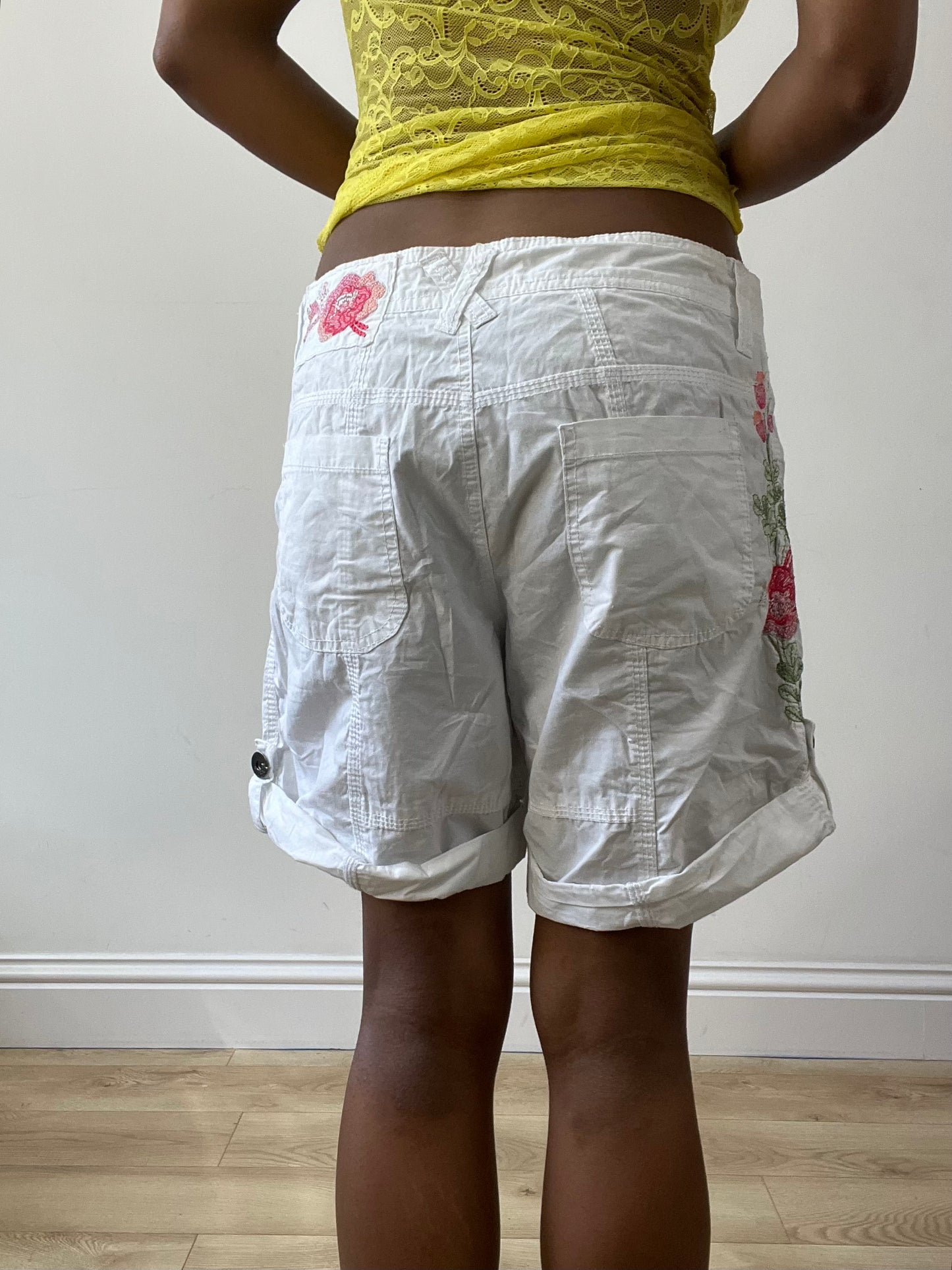 BEST PICKS | small white cargo shorts with pink floral embroidery detail