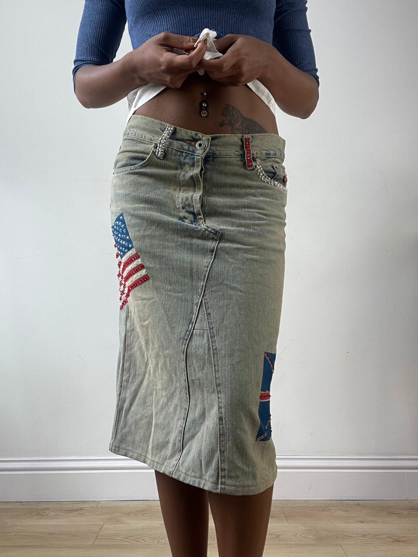LFW edit | small blue denim midi skirt with painted flags detail