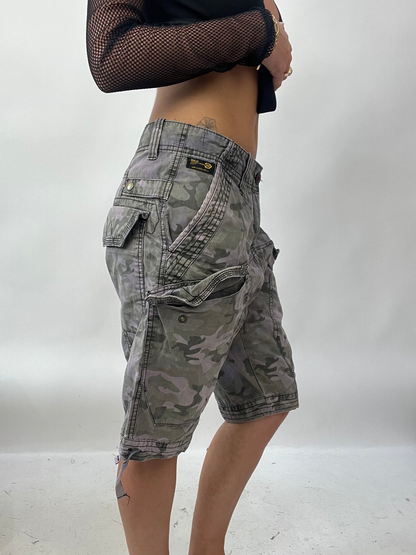 BRAT GIRL SUMMER DROP | large purple and green camo jorts
