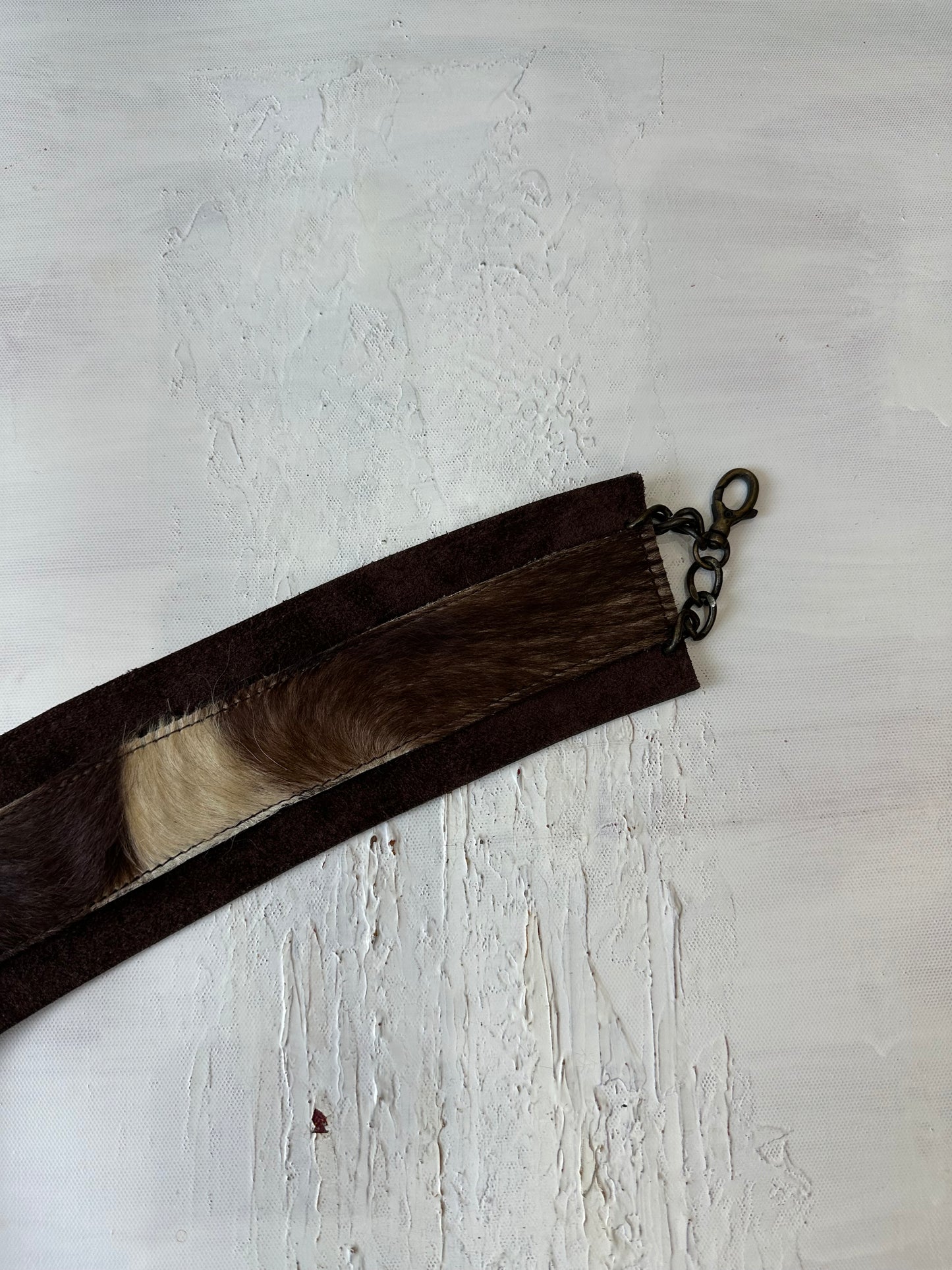 AUTUMN EDIT | brown faux fur belt with chain and tassel closure detail
