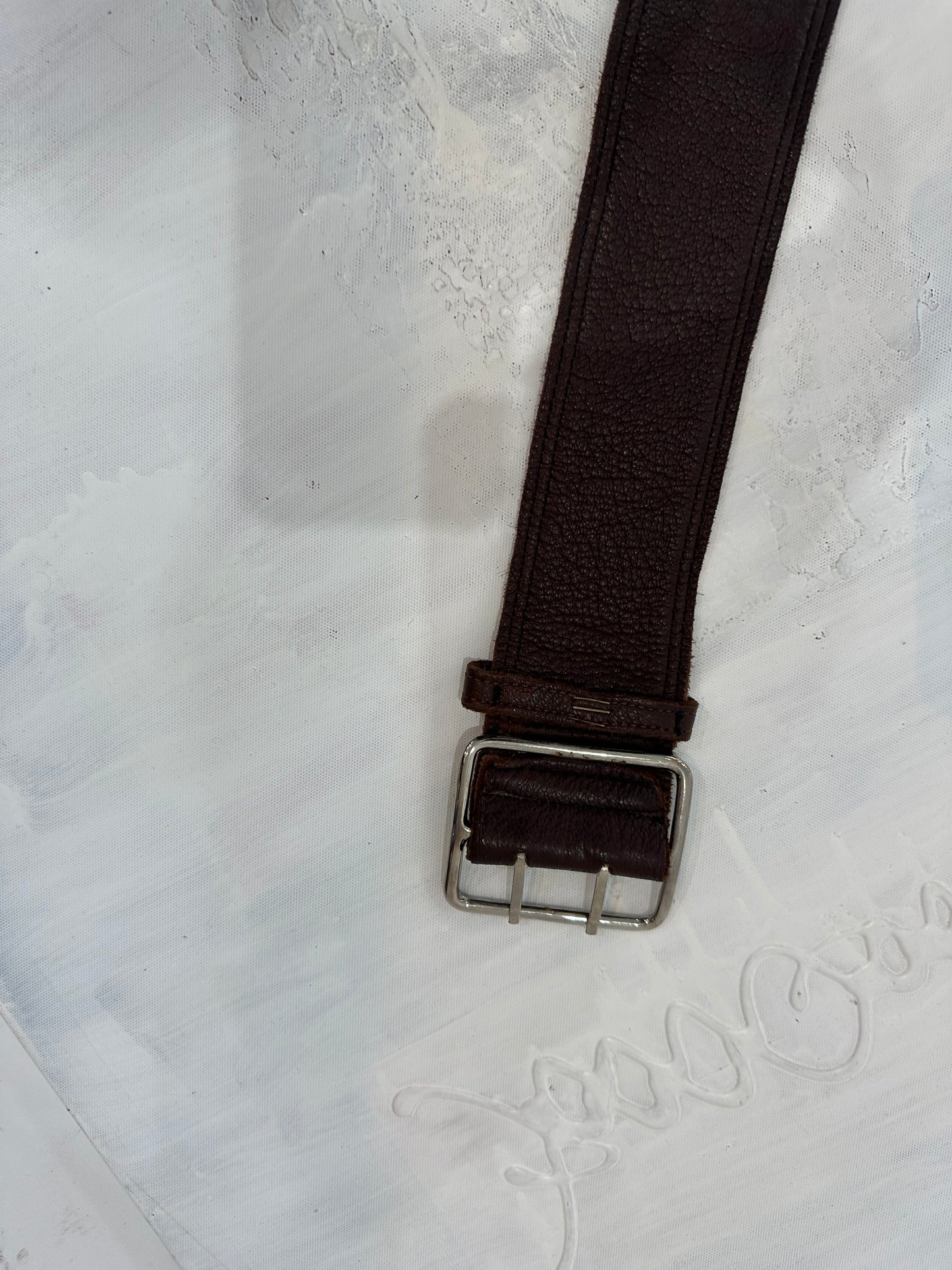 BEST PICKS | brown faux leather belt with silver eyelet detail