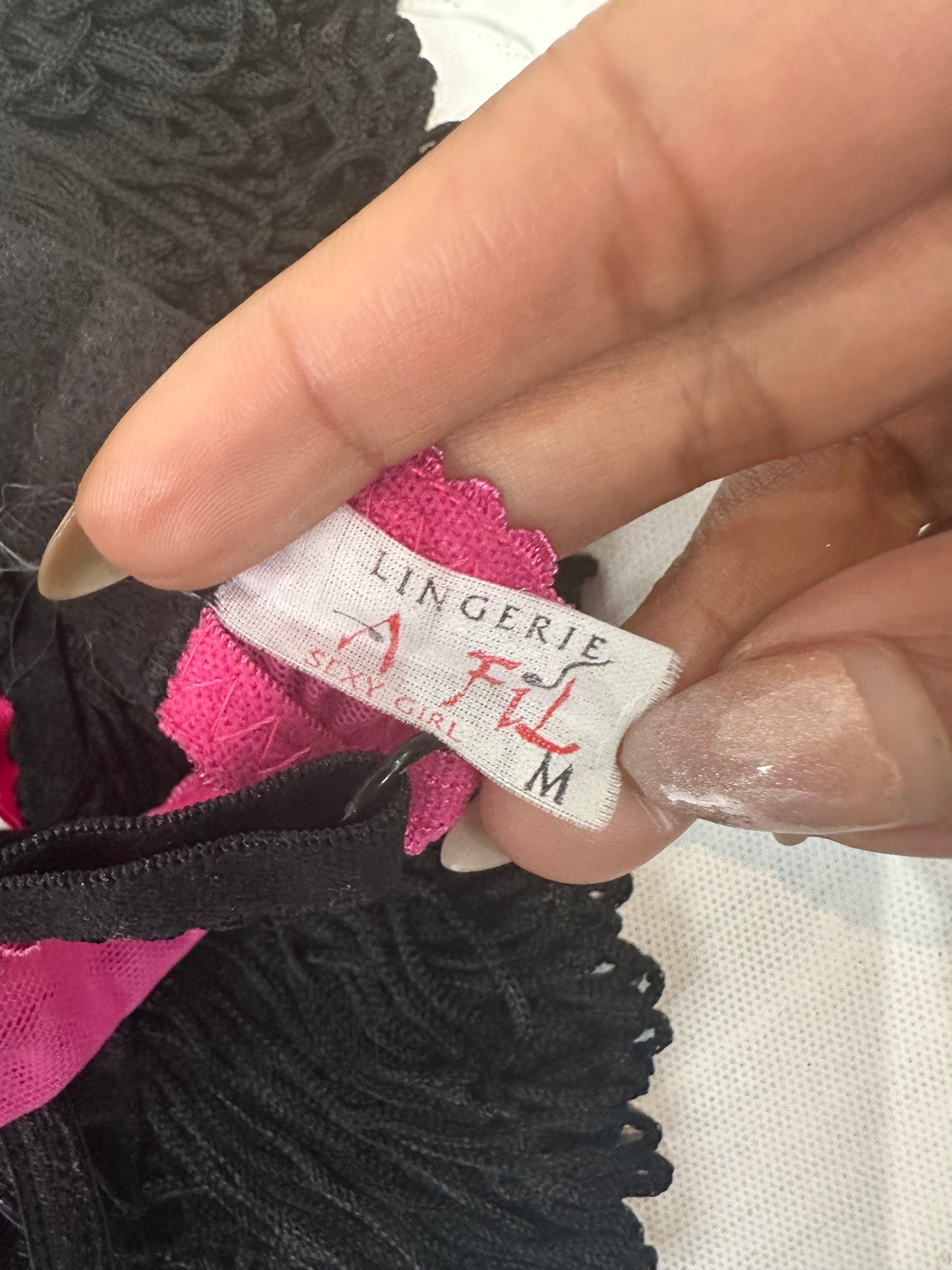 BEST PICKS | medium black and pink fringe bra and underwear set