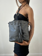 BEST PICKS | grey crossbody bag with tassel and studding details