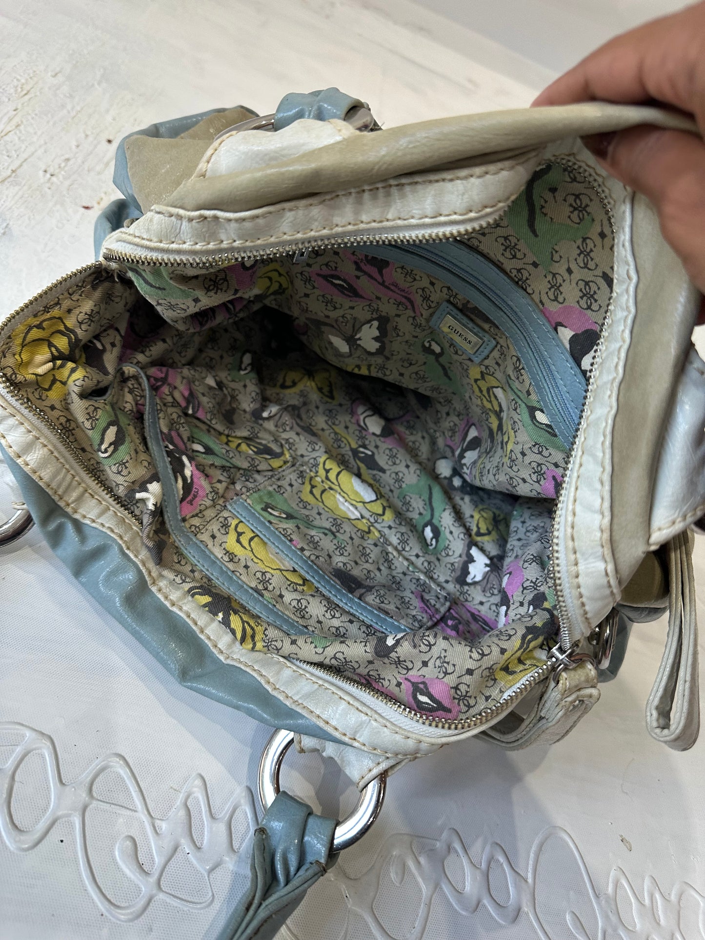 LFW edit | blue and beige guess faux leather bag with silver hardware
