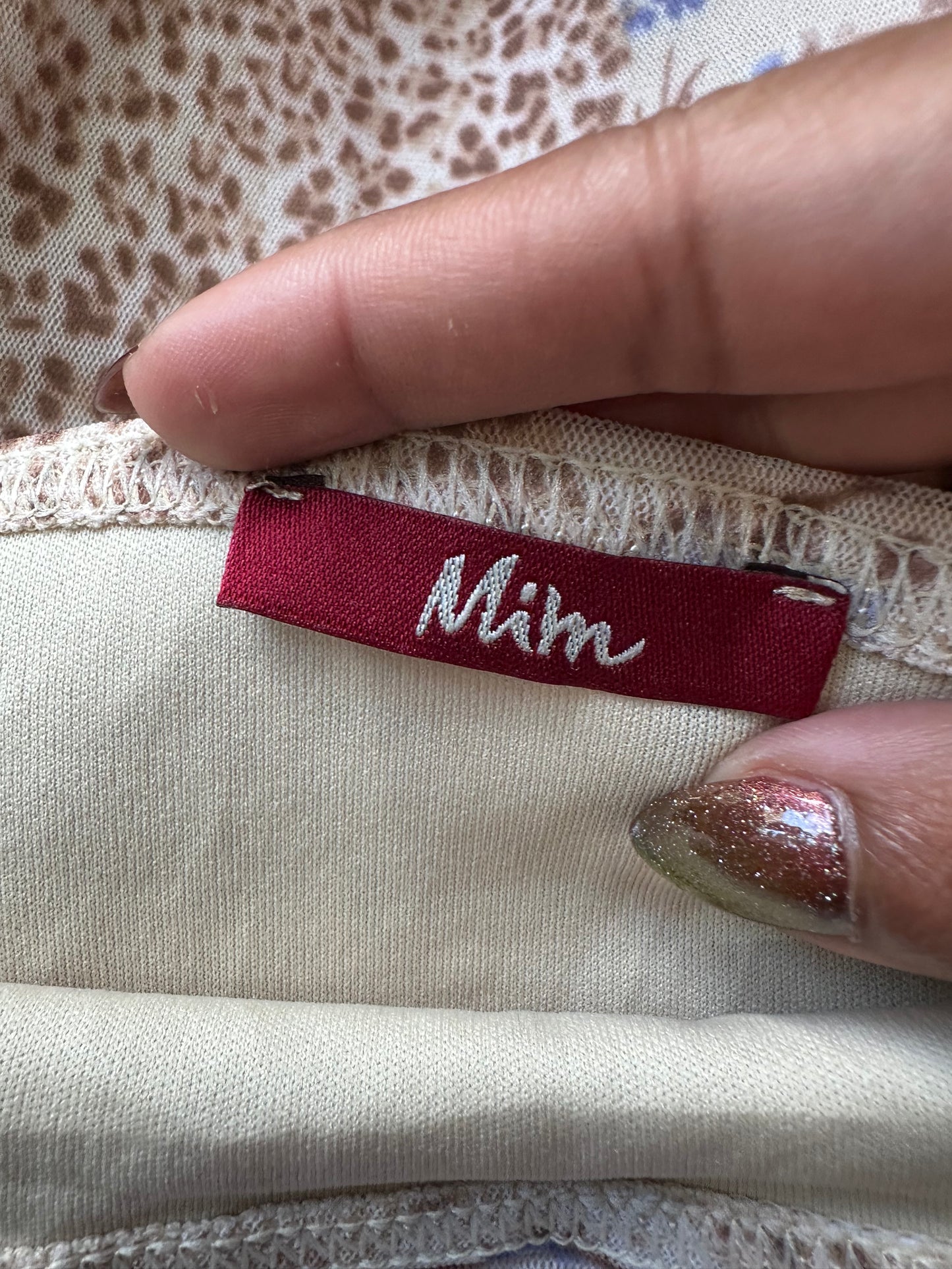BEST PICKS | small blue and tan midi skirt with floral print