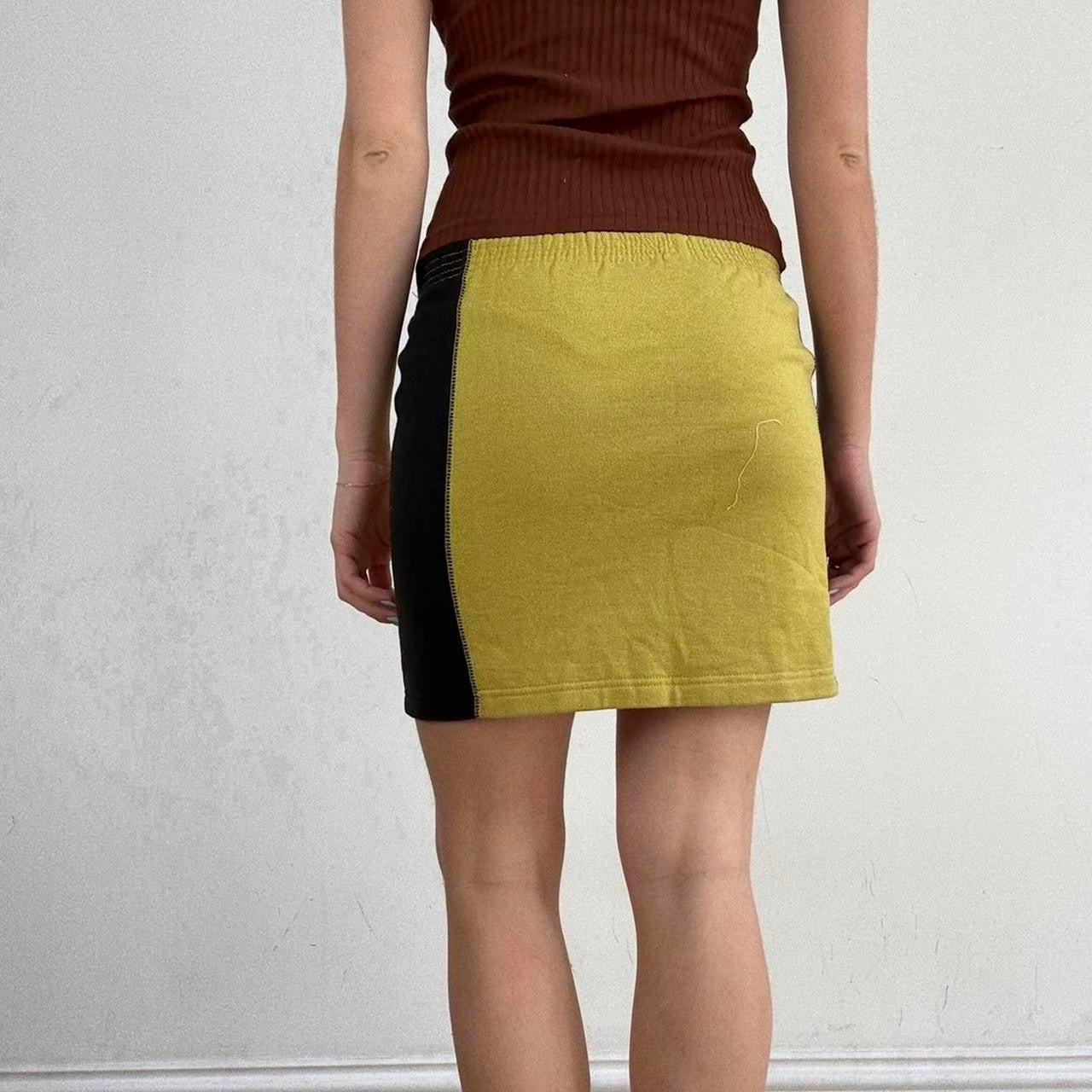 💻‼️small green and black kickers skirt