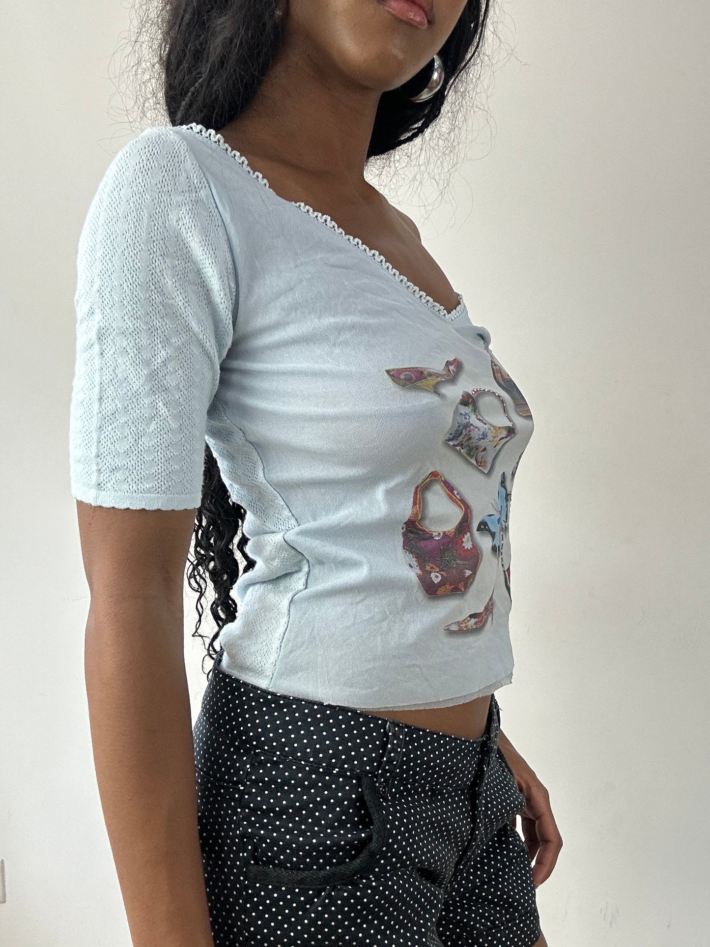 vintage edit twenty-five | small baby blue top with accessories graphic