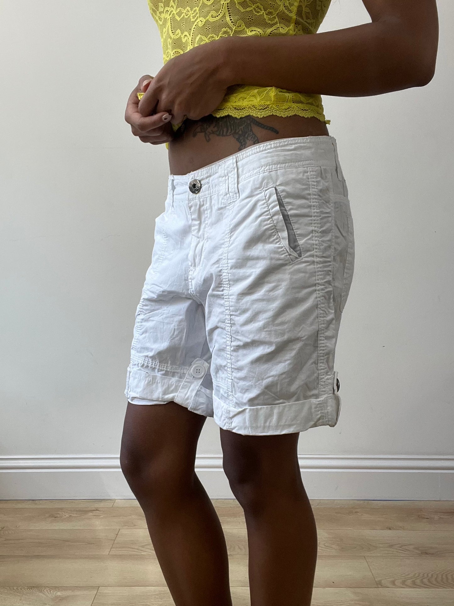 BEST PICKS | small white cargo shorts with pink floral embroidery detail