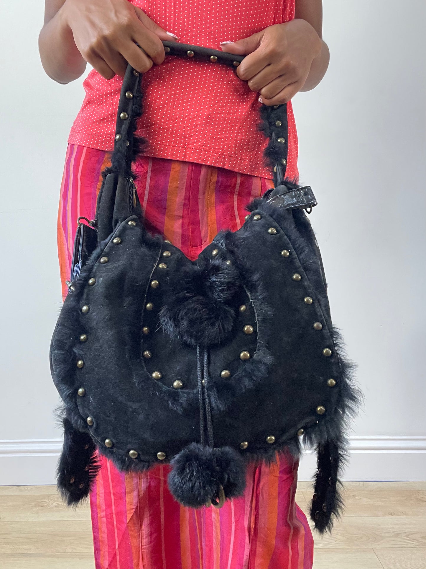 vintage edit twenty-seven | black studded faux fur shoulder bag with pom pom details