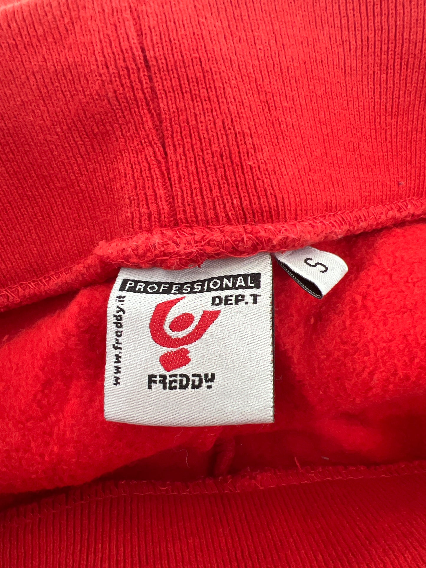 euro trash | small red tracksuit bottoms